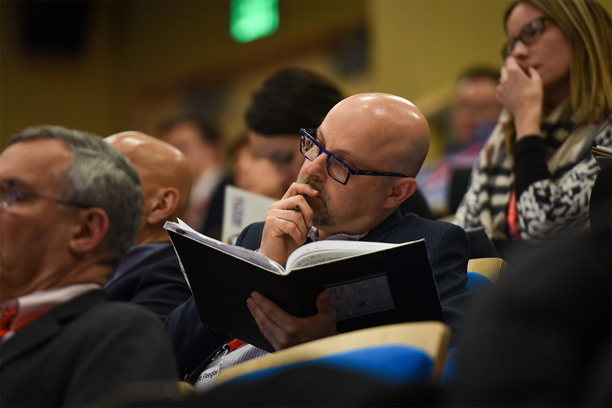Man in audience at Collaboration event at the Boston Public Library
