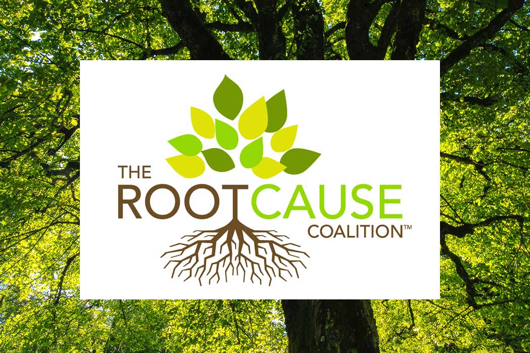 The Root Cause Coalition logo over background image of trees