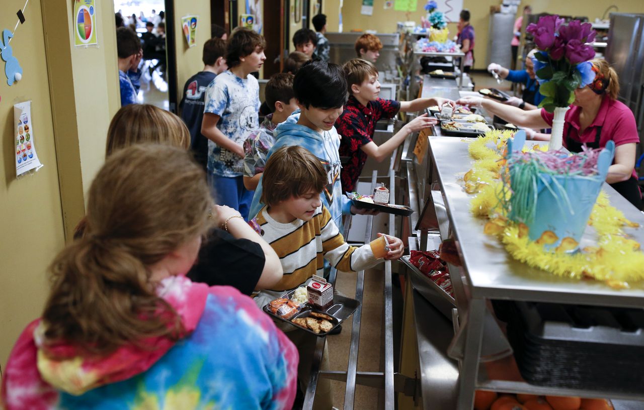 Students lined up for lunch at Plymouth Community Intermediate School in March. It's estimated that the federal universal school meal program, set to expire on June 30, can save some families about $1,200 a year in grocery bills.JONATHAN WIGGS/GLOBE STAFF